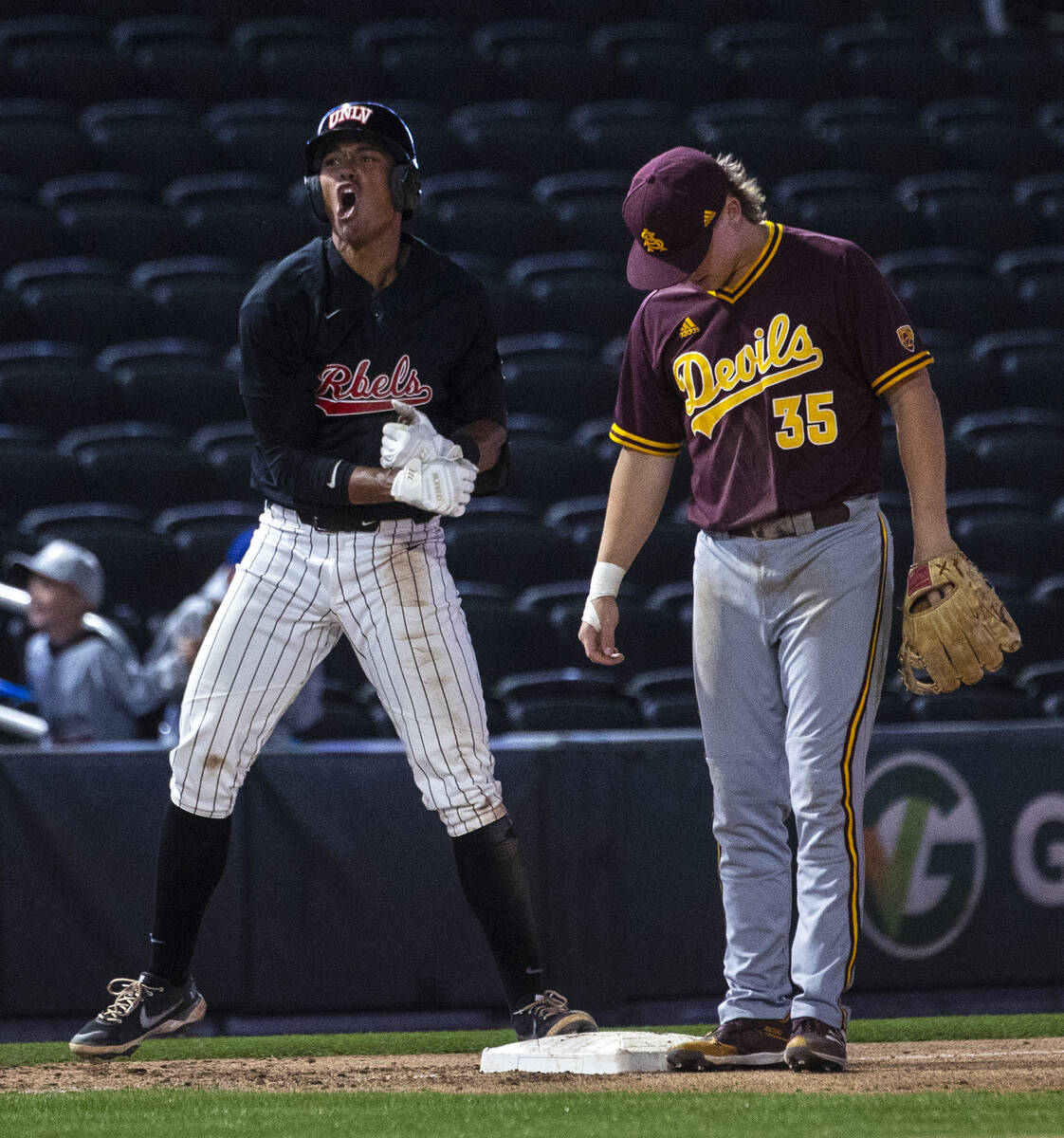 UNLV infielder Edarian Williams (2) reacts after hitting triple against Arizona St. as Arizona ...