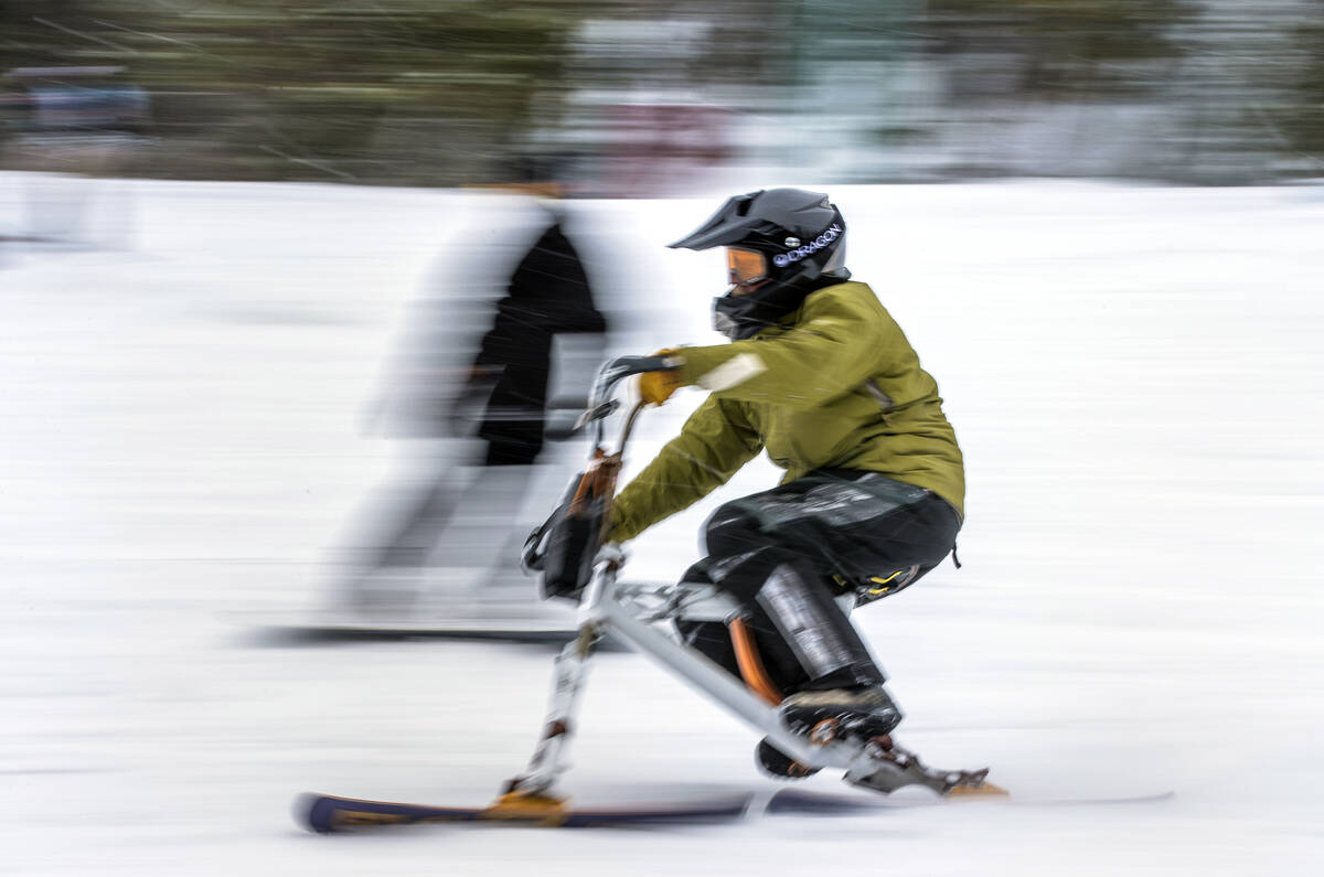 Terry Sadler of Mount Charleston cruises down a run on his snow bike at Lee Canyon on the final ...