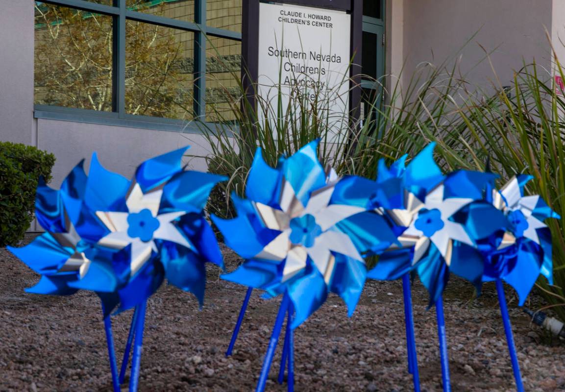 Pinwheels are planted outside the Southern Nevada Children’s Advocacy Center within the ...