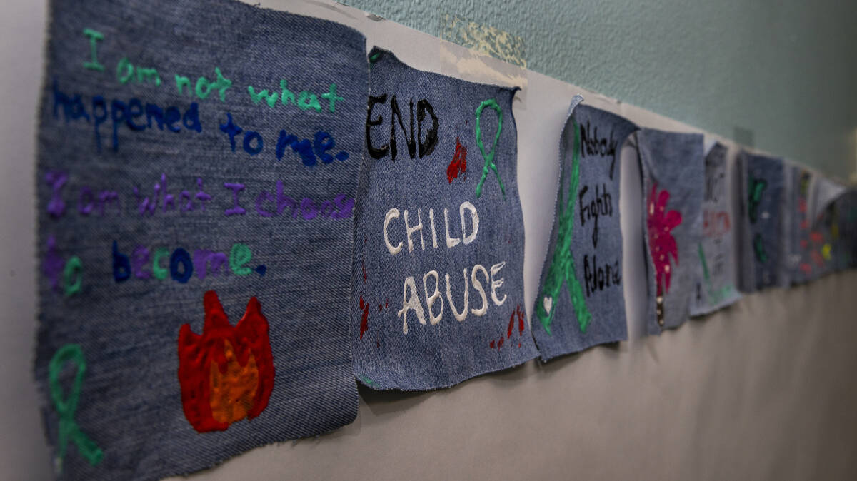 Painted fabric squares line the lobby of the Southern Nevada Children’s Advocacy Center ...