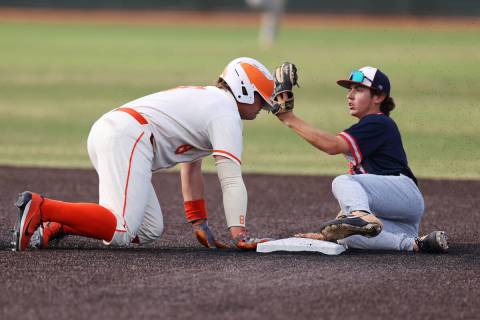 Bishop Gorman’s Gunnar Myro (8) is tagged out at second base by Liberty’s Dylan F ...