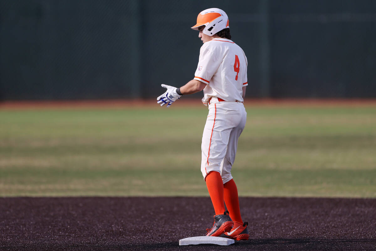 Bishop Gorman’s Anthony Marnell (4) reacts after hitting a double during a baseball game ...