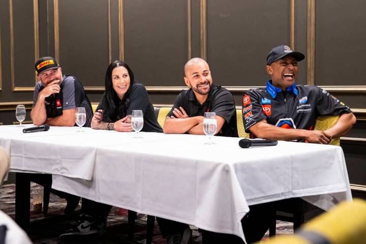 Drivers, from right, Antron Brown, J.R. Todd, Alexis DeJoria, and Shawn Langdon watch a blooper ...