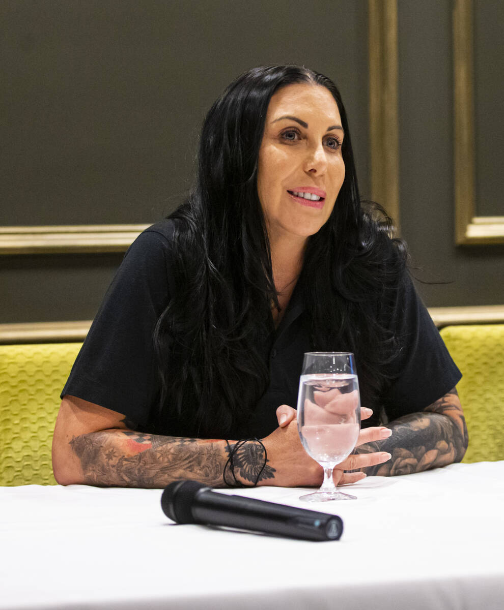Funny car driver Alexis DeJoria speaks during a press conference ahead of the NHRA Four-Wide Na ...