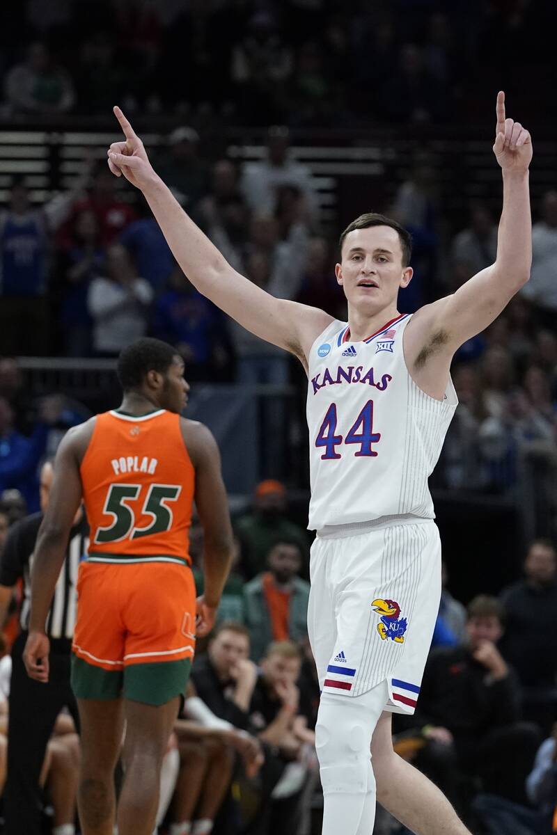 Kansas' Mitch Lightfoot reacts during the second half of a college basketball game in the Elite ...