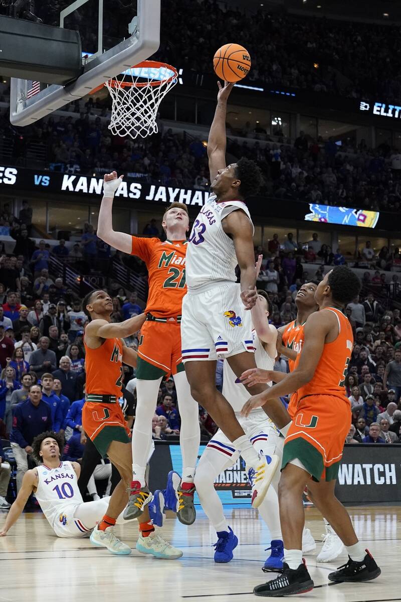 Kansas' David McCormack shoots during the second half of a college basketball game in the Elite ...