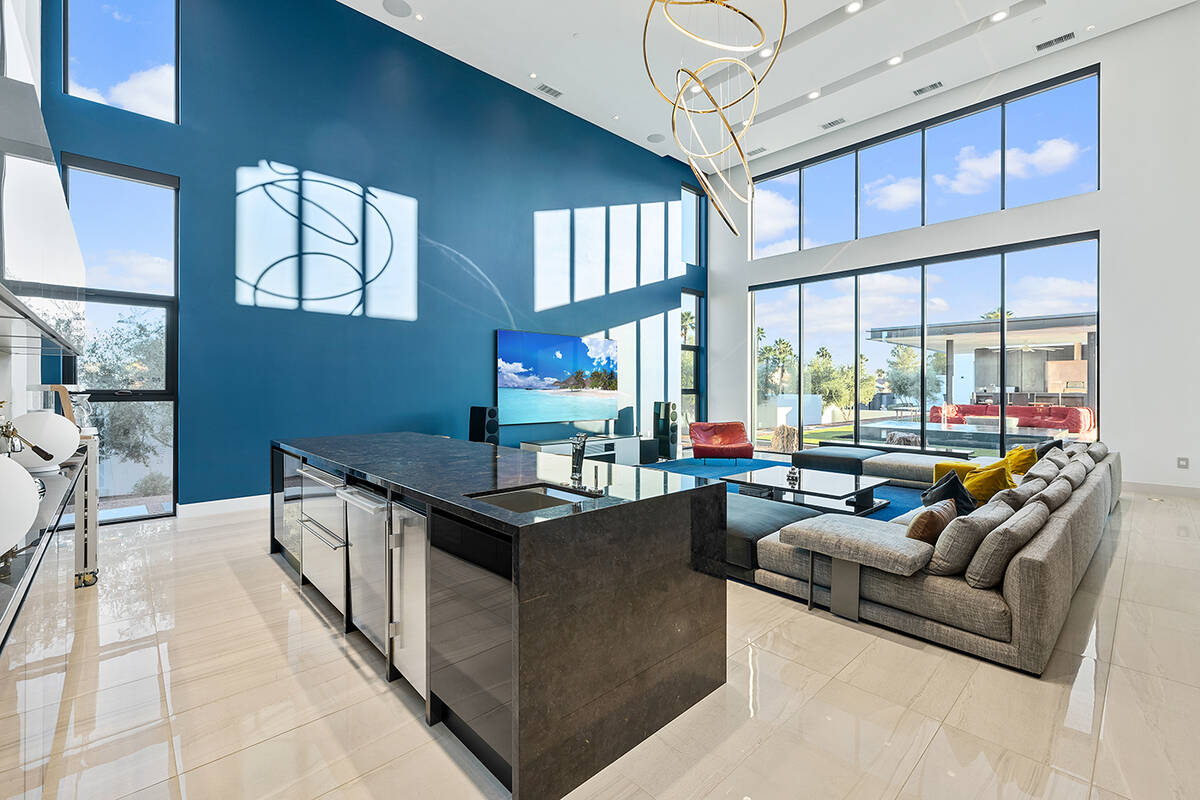 The home features floor-to-ceiling windows. (Napoli Group)