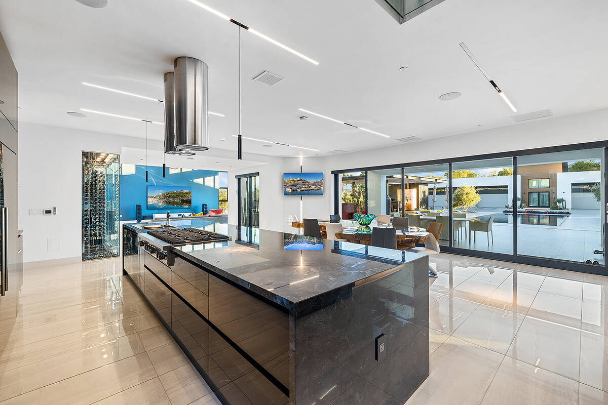 The kitchen features a long island. (Napoli Group)