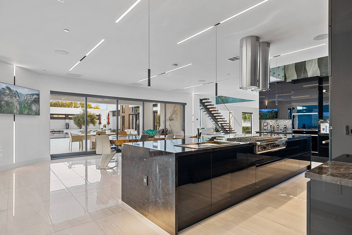 The kitchen opens to the patio. (Napoli Group)