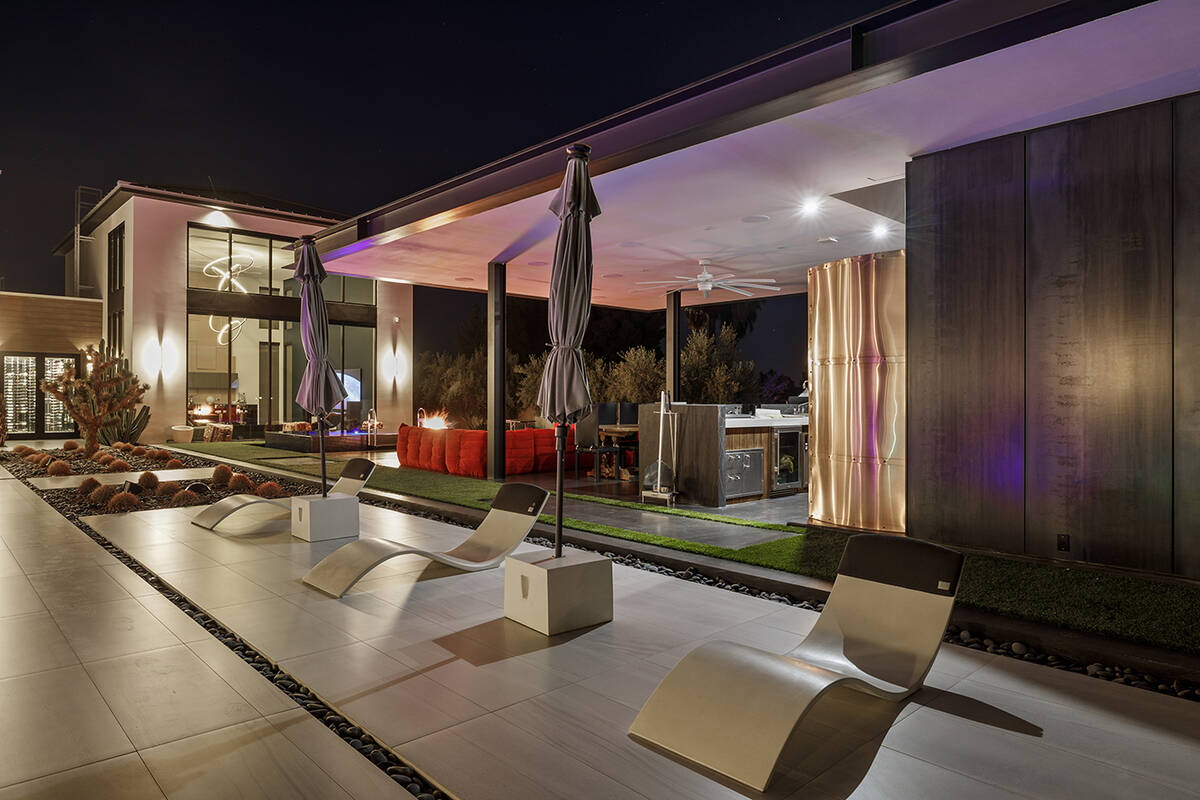 The home has an outdoor kitchen. (Napoli Group)