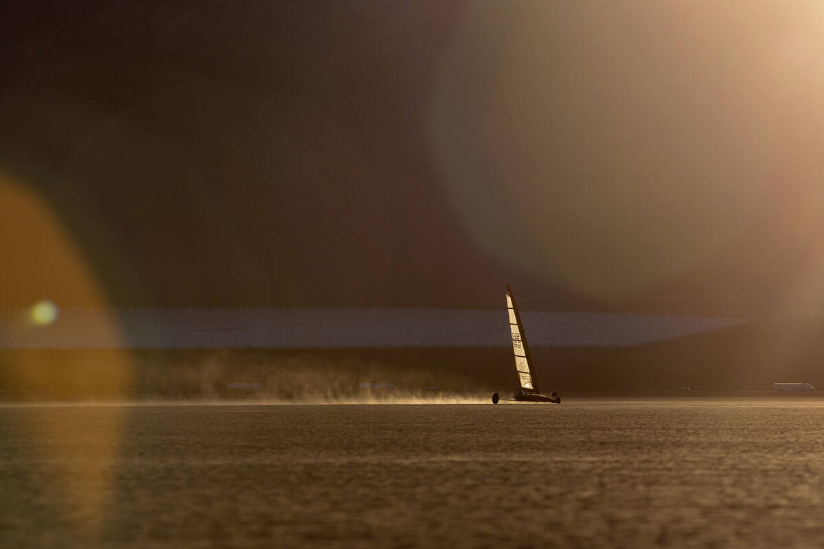 Renee Fields sails her Class 3 land yacht as the sun sets at Ivanpah Dry Lake on Thursday, Marc ...