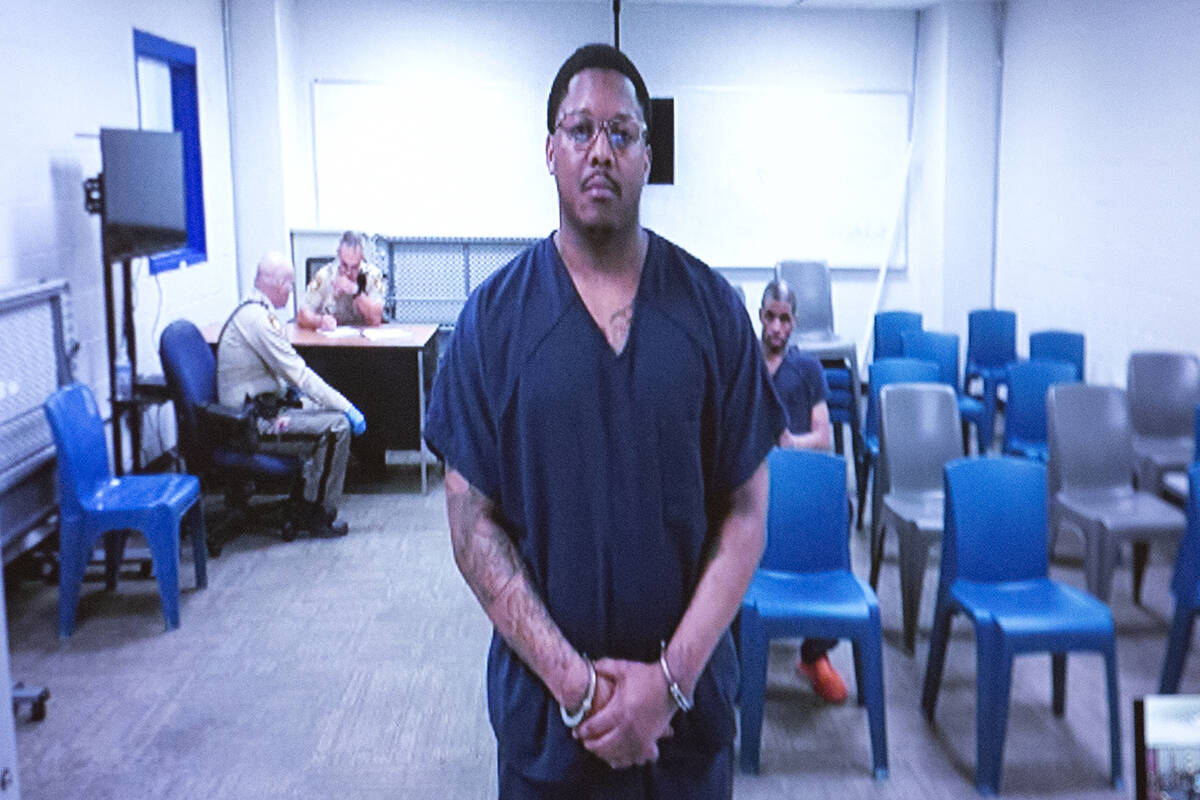 Michael Mosley, who pleaded guilty to murder and robbery charges, attends a sentencing hearing ...
