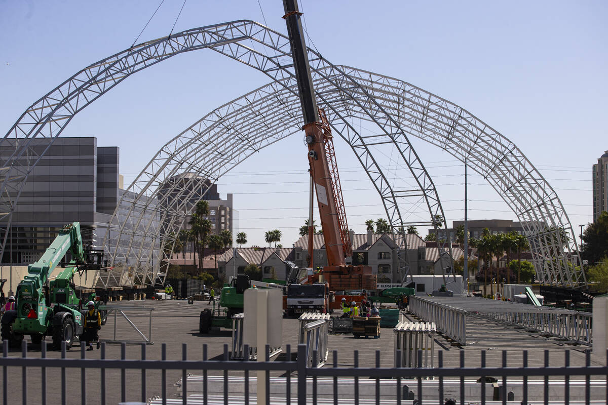 Workers begin to build out the NFL Draft Theater at Caesars Forum on Monday, April 4, 2022, in ...