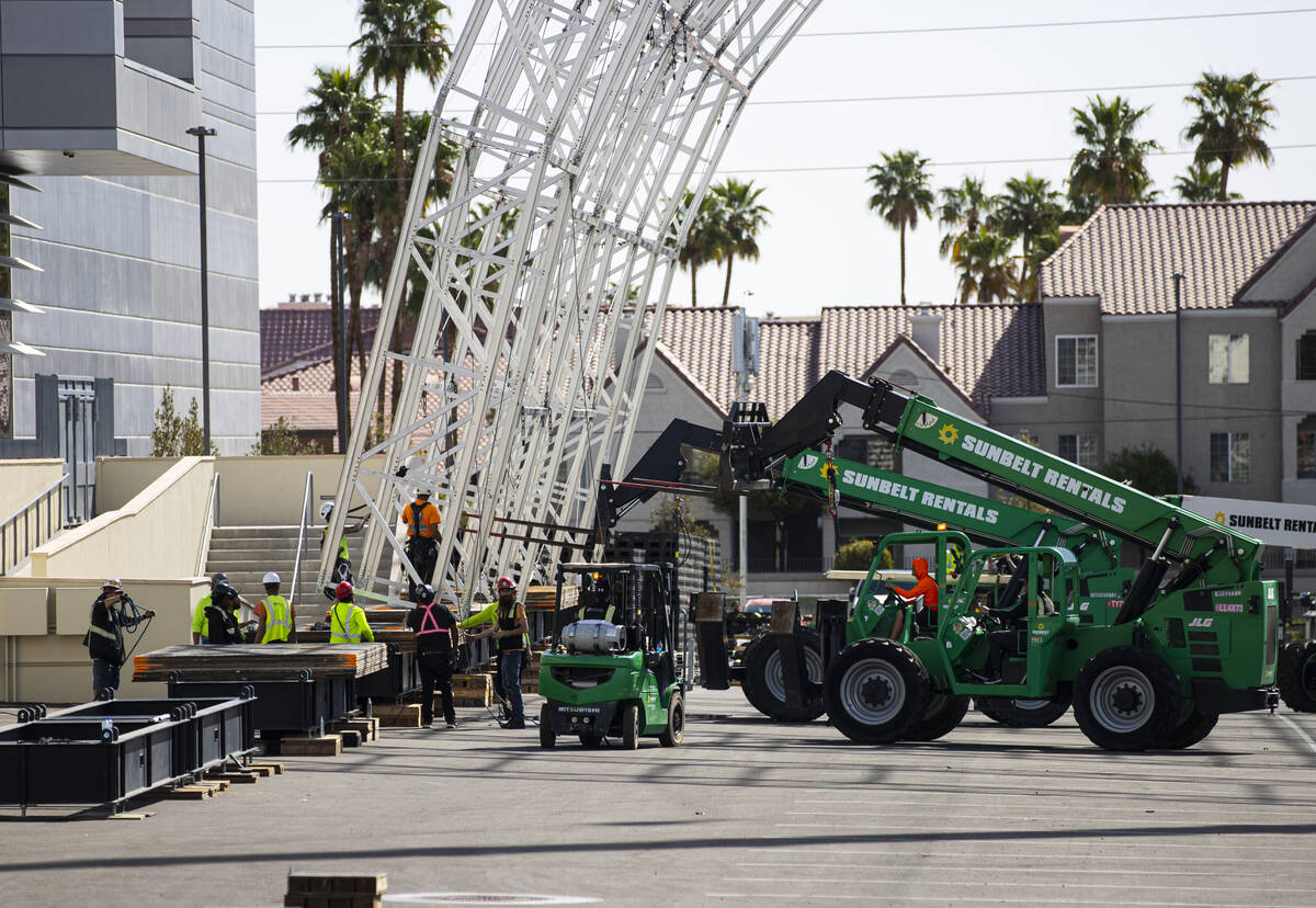 Workers begin to build out the NFL Draft Theater at Caesars Forum on Monday, April 4, 2022, in ...