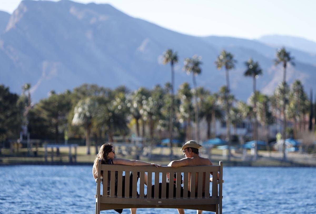 Desert Shores residents Michelle Perlmutter and her husband Alan enjoy a beautiful day by Lake ...