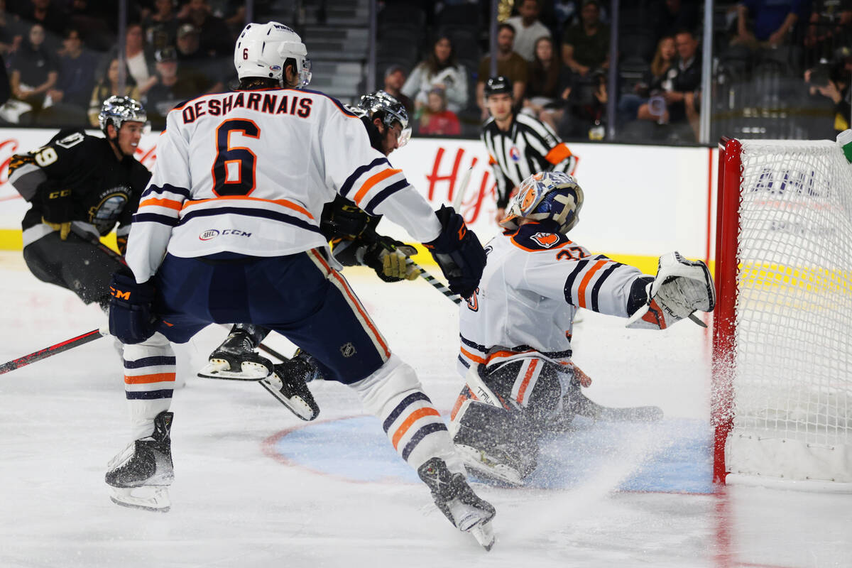 Henderson Silver Knights Paul Cotter (43) shoots for a score against Bakersfield Condors Ilya K ...