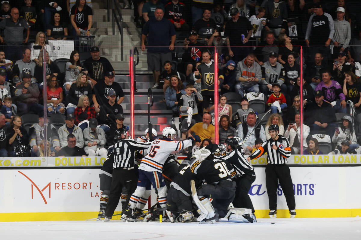 A fight breaks out between the Henderson Silver Knights and the Bakersfield Condors during the ...
