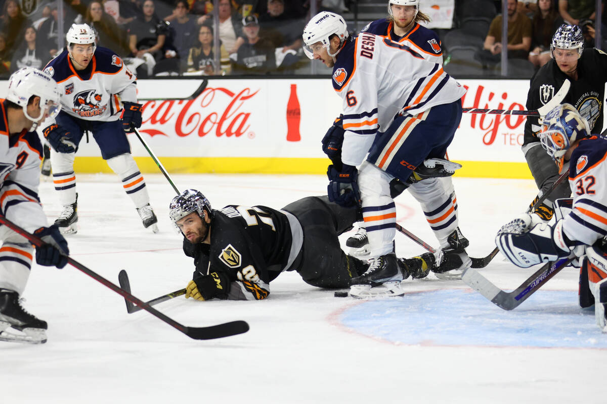 Henderson Silver Knights Gage Quinney (72) takes a fall against the Bakersfield Condors during ...