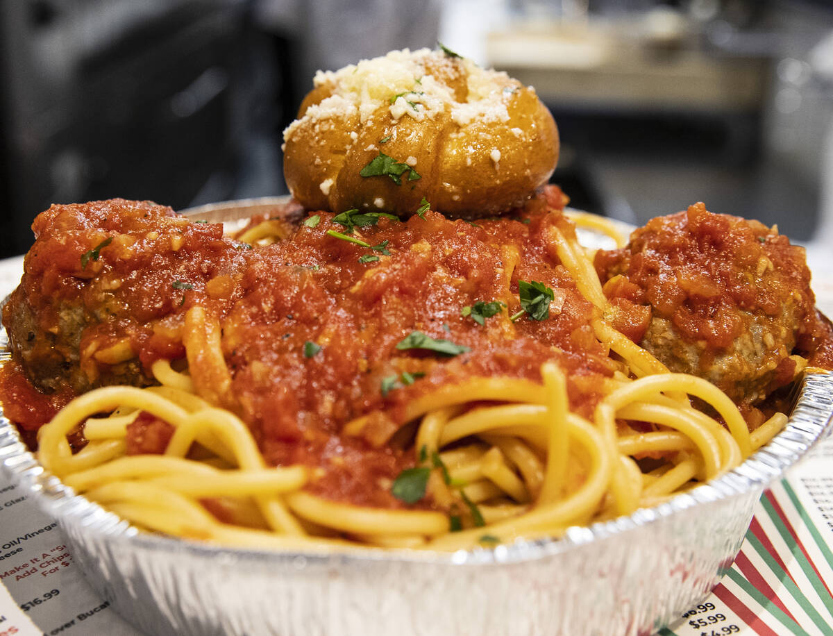 Buccatini and meatballs with garlic bread is displayed at Stallone's Italian Eatery on 467 E. S ...