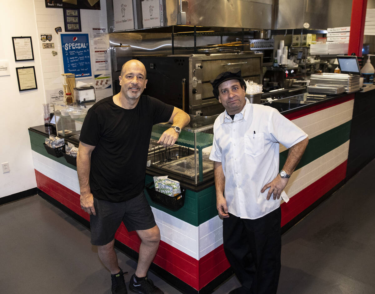 Brett Raymer, left, co-owner of Stallone's Italian Eatery and Chef Louie Zweifach pose for a ph ...