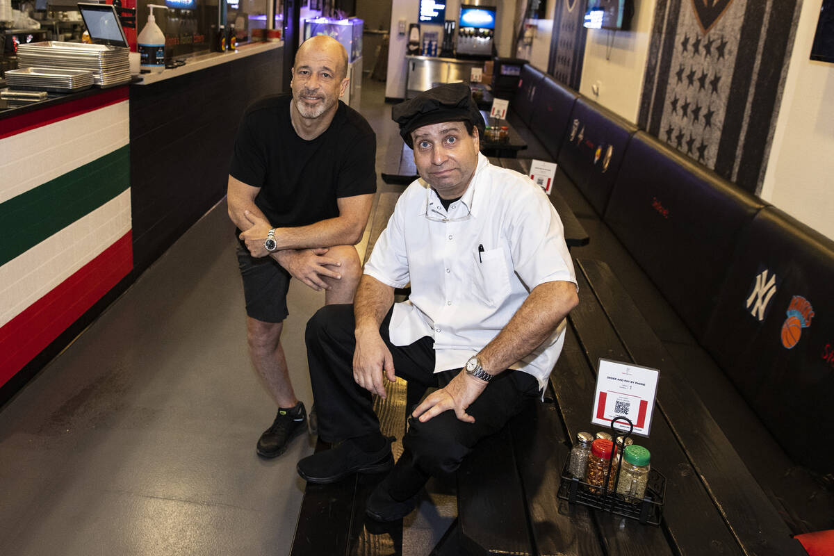Brett Raymer, left, co-owner of Stallone's Italian Eatery and Chef Louie Zweifach pose for a ph ...