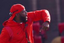 UNLV Rebels defensive coordinator Keith Heyward motions to his players during the first day of ...