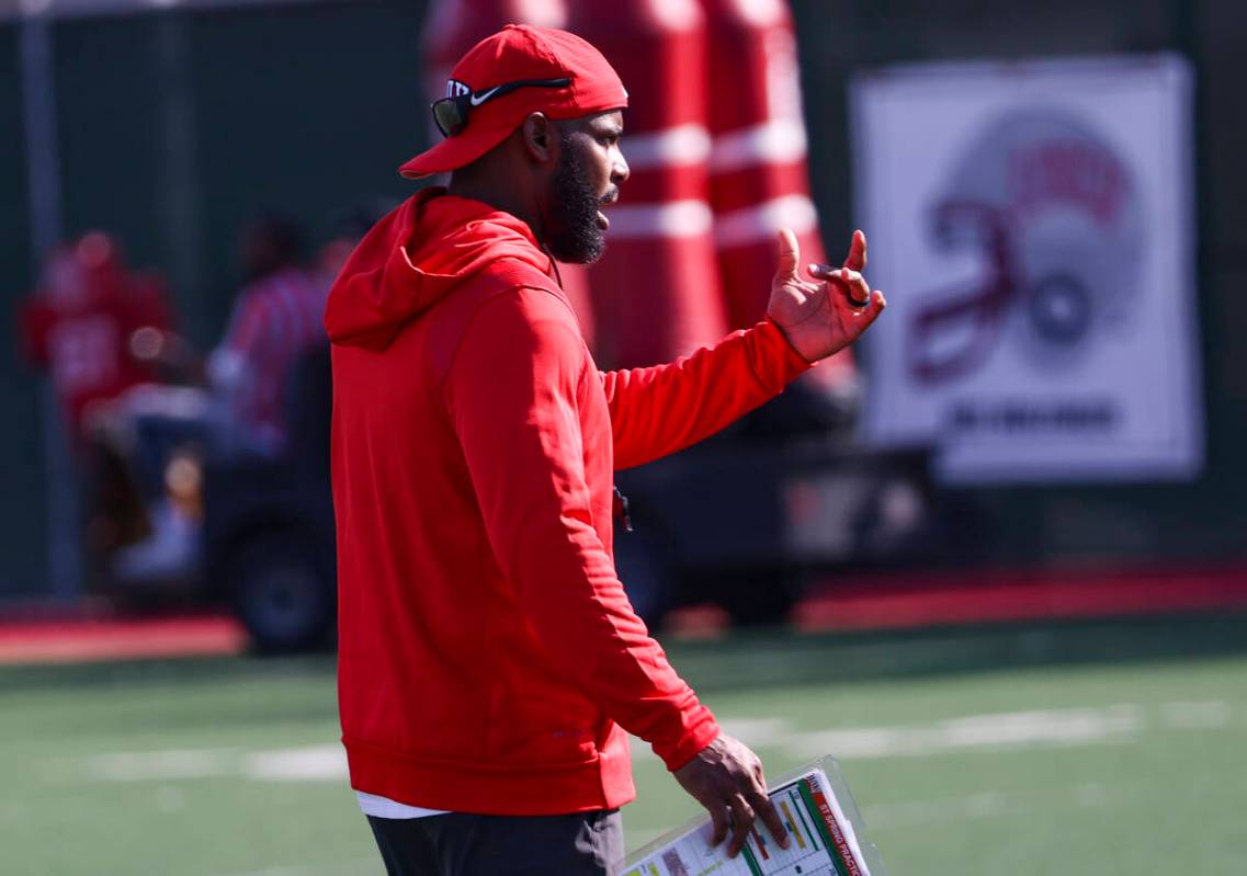 UNLV Rebels defensive coordinator Keith Heyward motions to his players during the first day of ...