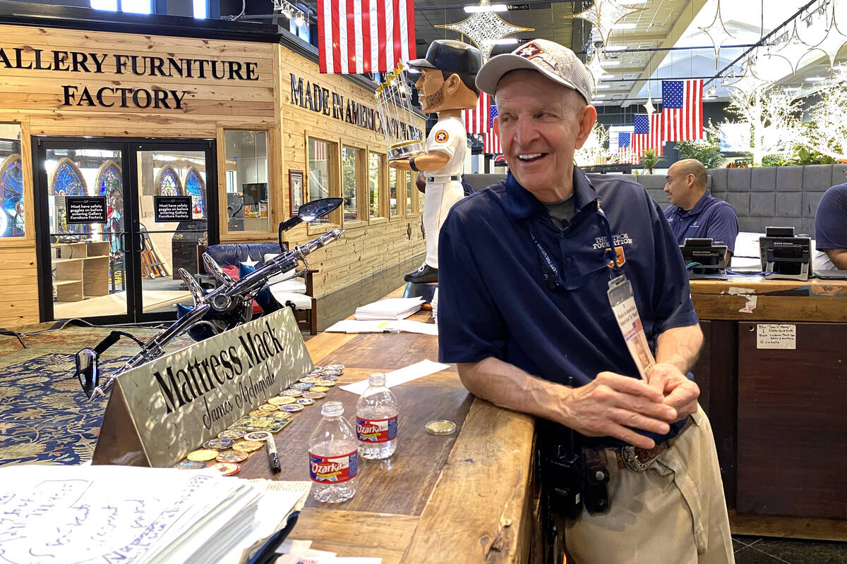 Houston furniture store owner Jim "Mattress Mack" McIngvale, 68, mans the counter in ...