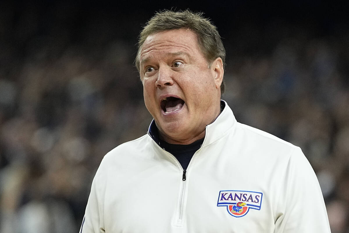 Kansas head coach Bill Self yells during the first half of a college basketball game against Vi ...