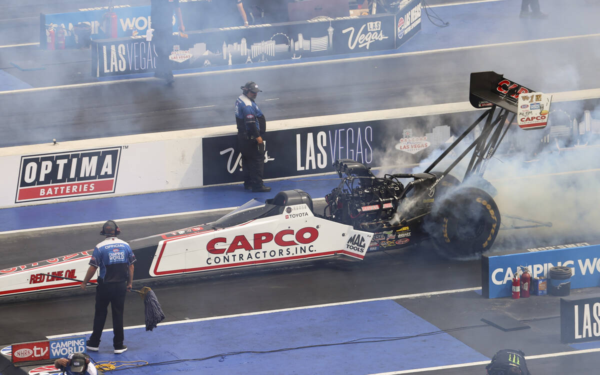 Top Fuel driver Steve Torrence does a burnout before the second round of Top Fuel eliminations ...