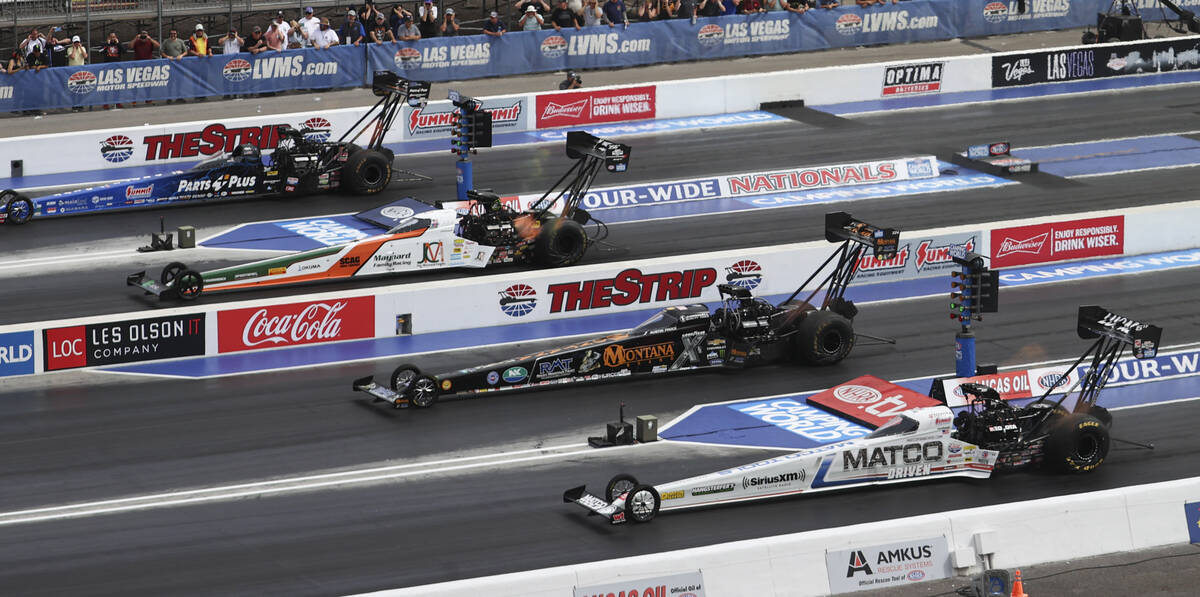 Top Fuel drivers, from left, Clay Millican, Tony Schumacher, Austin Prock, and Antron Brown com ...