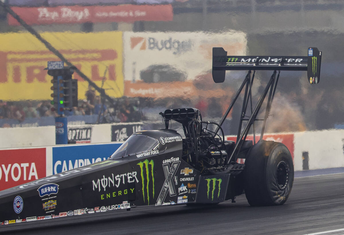 Top Fuel driver Brittany Force takes off to win in the finals of the Top Fuel eliminations at t ...