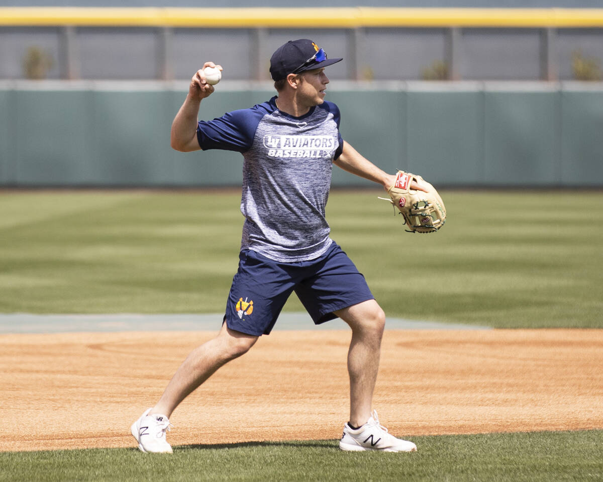 The Las Vegas Aviators infielder Nick Allen (2) throws the ball during media day practice at th ...