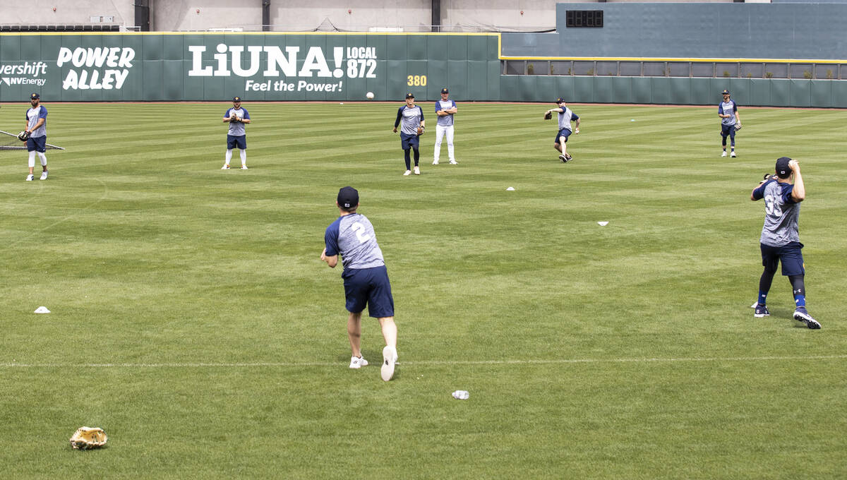 The Las Vegas Aviators players, including infielder Nick Allen (2) and catcher Shea Langeliers ...