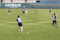 The Las Vegas Aviators players, including infielder Nick Allen (2) and catcher Shea Langeliers ...