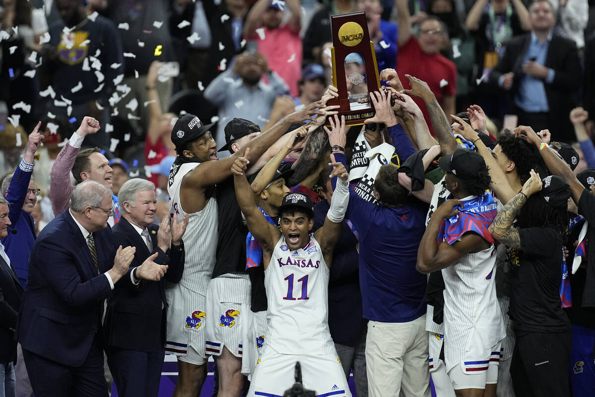 Kansas guard Remy Martin (11) celebrates after a college basketball game against North Carolina ...