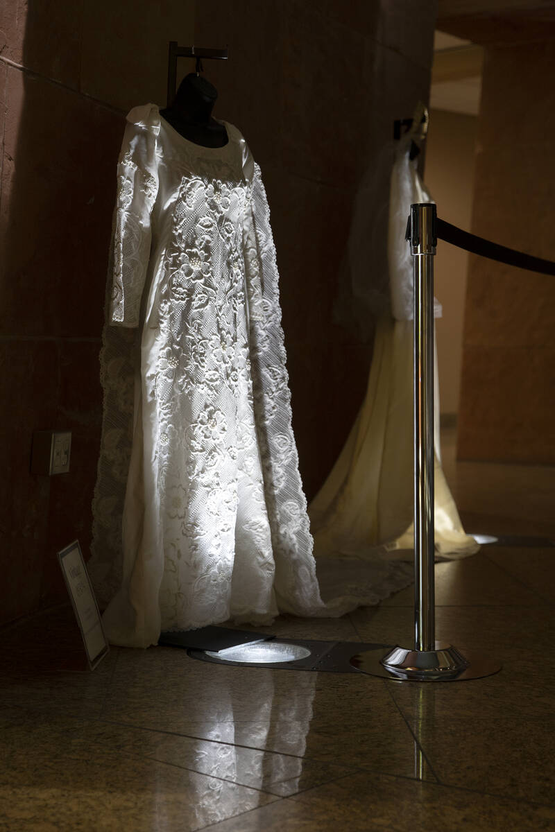 A vintage wedding dress is on display as part of a historical wedding exhibit in the rotunda at ...