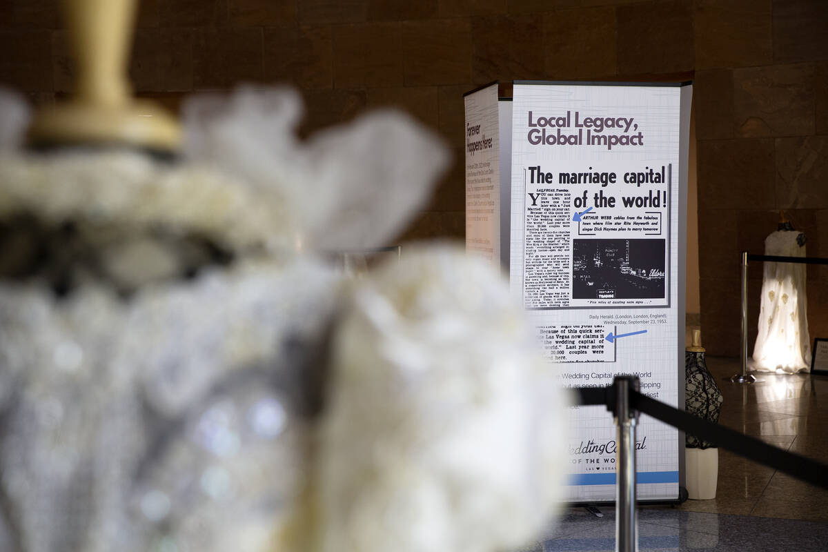 A historical wedding exhibit is on display in the rotunda at the Clark County Government Center ...