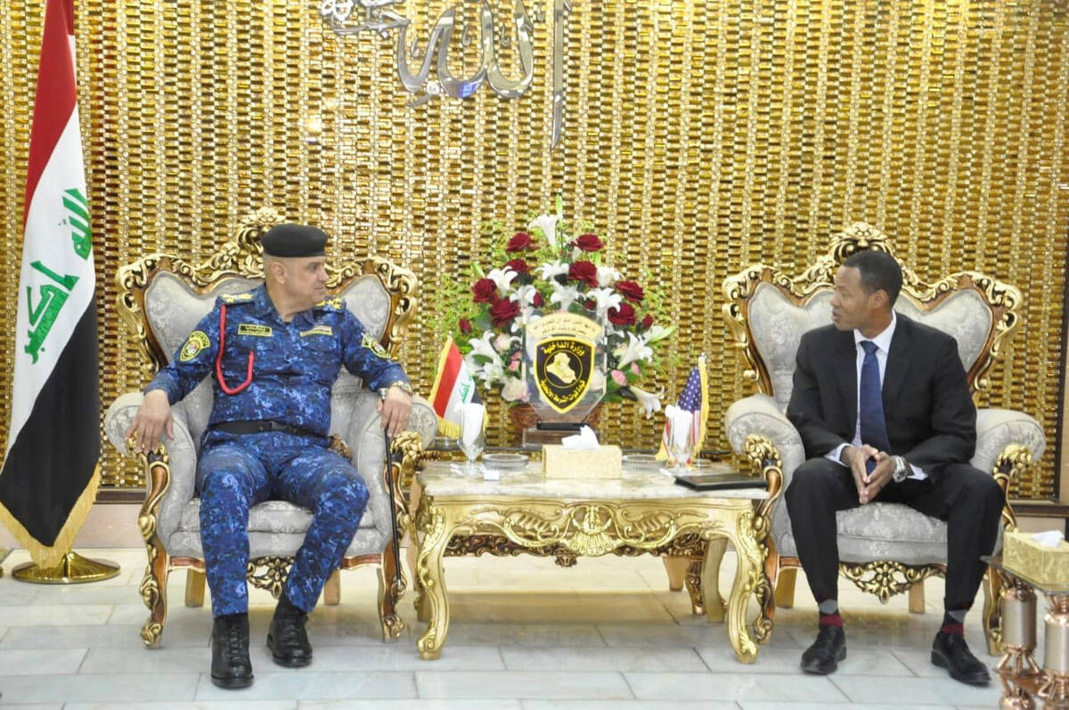 Supervisory Special Agent Lawrence Casselle meets with an Iraqi Security Forces general in Bagh ...