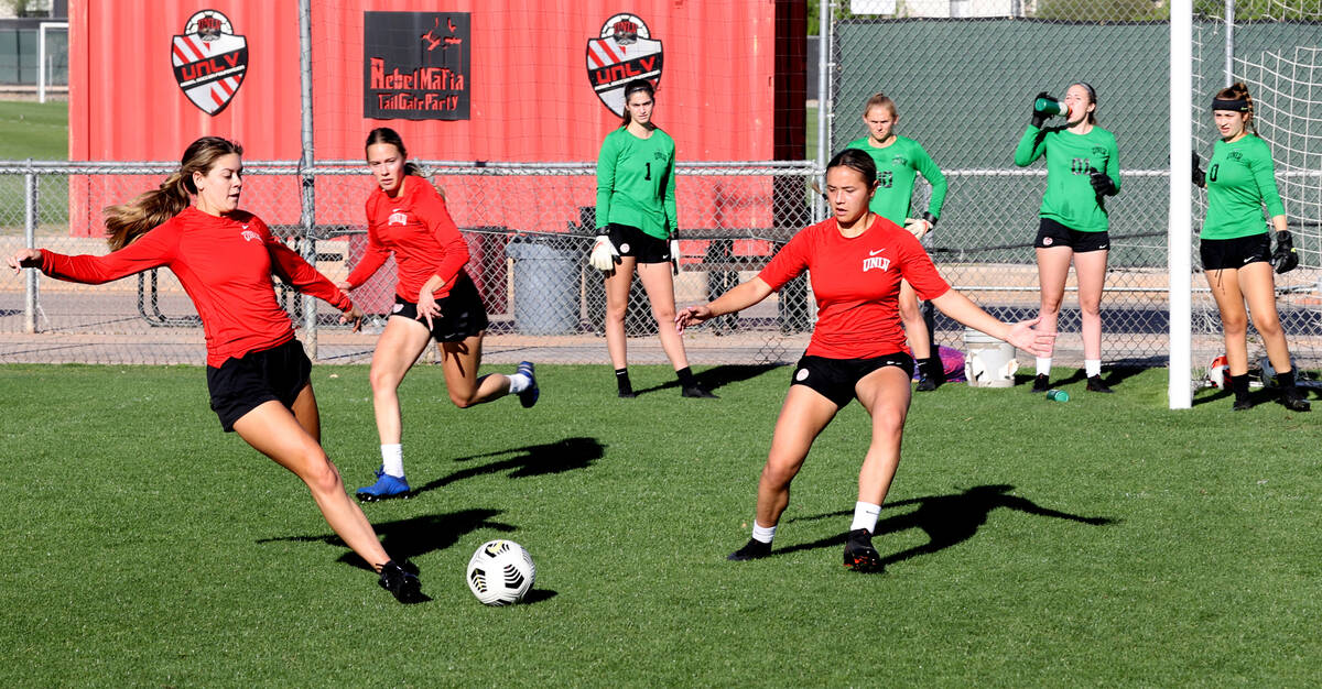 Members of the UNLV women’s soccer team practice at Peter Johann Field in Las Vegas Frid ...