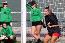 UNLV women’s soccer coach Jenny Ruiz-Williams instructs players during practice at Peter ...