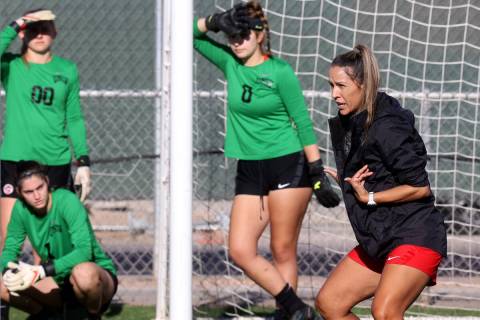 UNLV women’s soccer coach Jenny Ruiz-Williams instructs players during practice at Peter ...