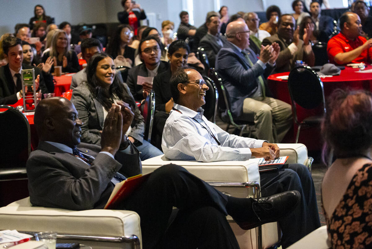 Competition judge Rama Venkat, dean of engineering at UNLV, center, is introduced before presen ...