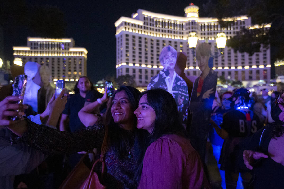 Shwe Krishna, left, and Nandini Sahni, who traveled from the East Coast to see BTS perform at A ...
