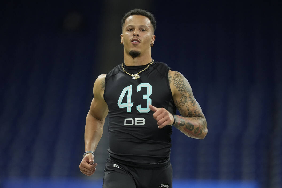 Miami defensive back Bubba Bolden runs the 40-yard dash at the NFL football scouting combine, S ...