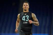 Miami defensive back Bubba Bolden runs the 40-yard dash at the NFL football scouting combine, S ...
