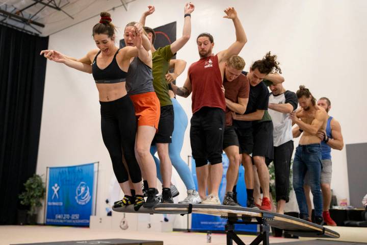 Performers for the teeterboard act rehearse a scene for IGNITE at Nevada Rhythmic Academy on Fr ...