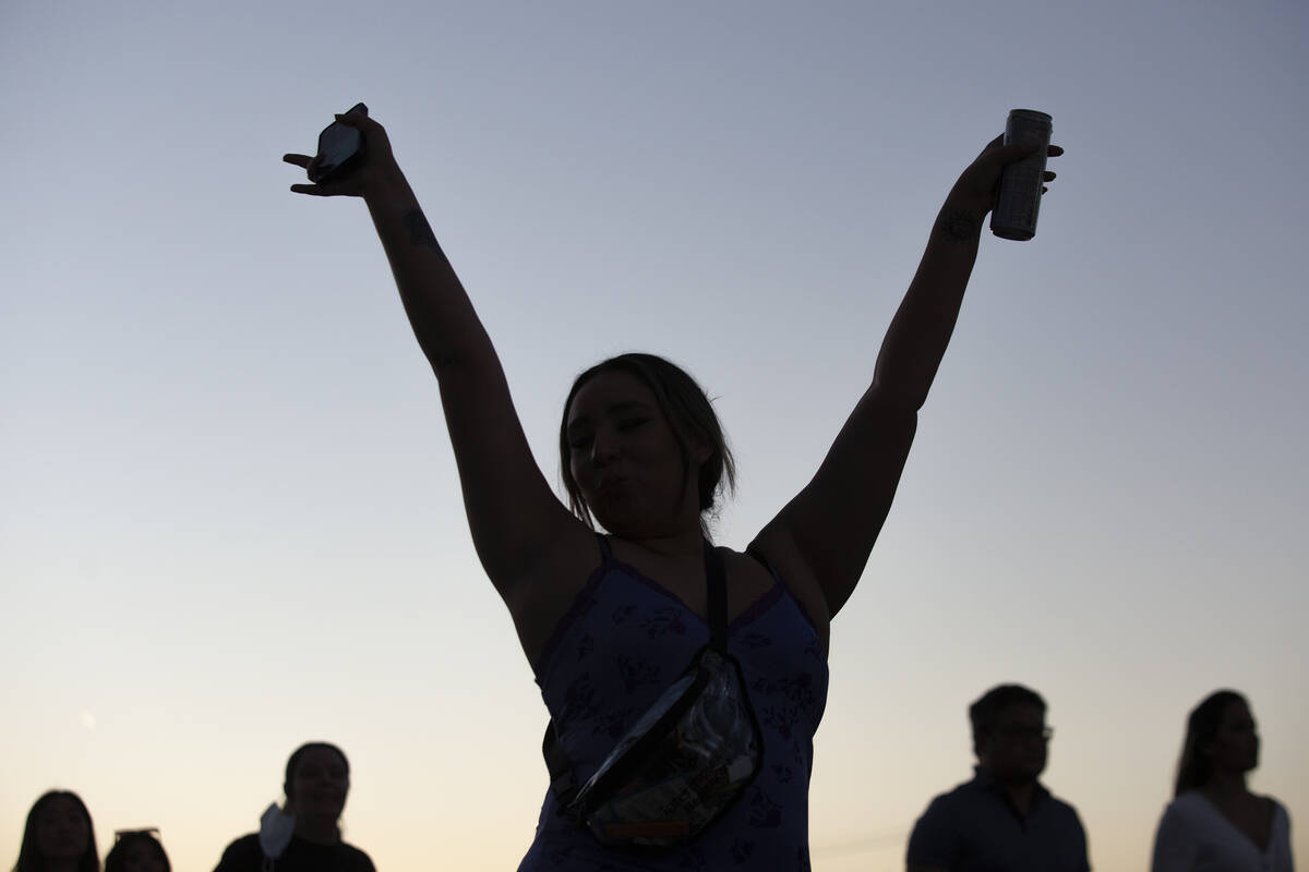 A BTS fan dances her way into Allegiant Stadium for the Korean boy band’s sold-out openi ...
