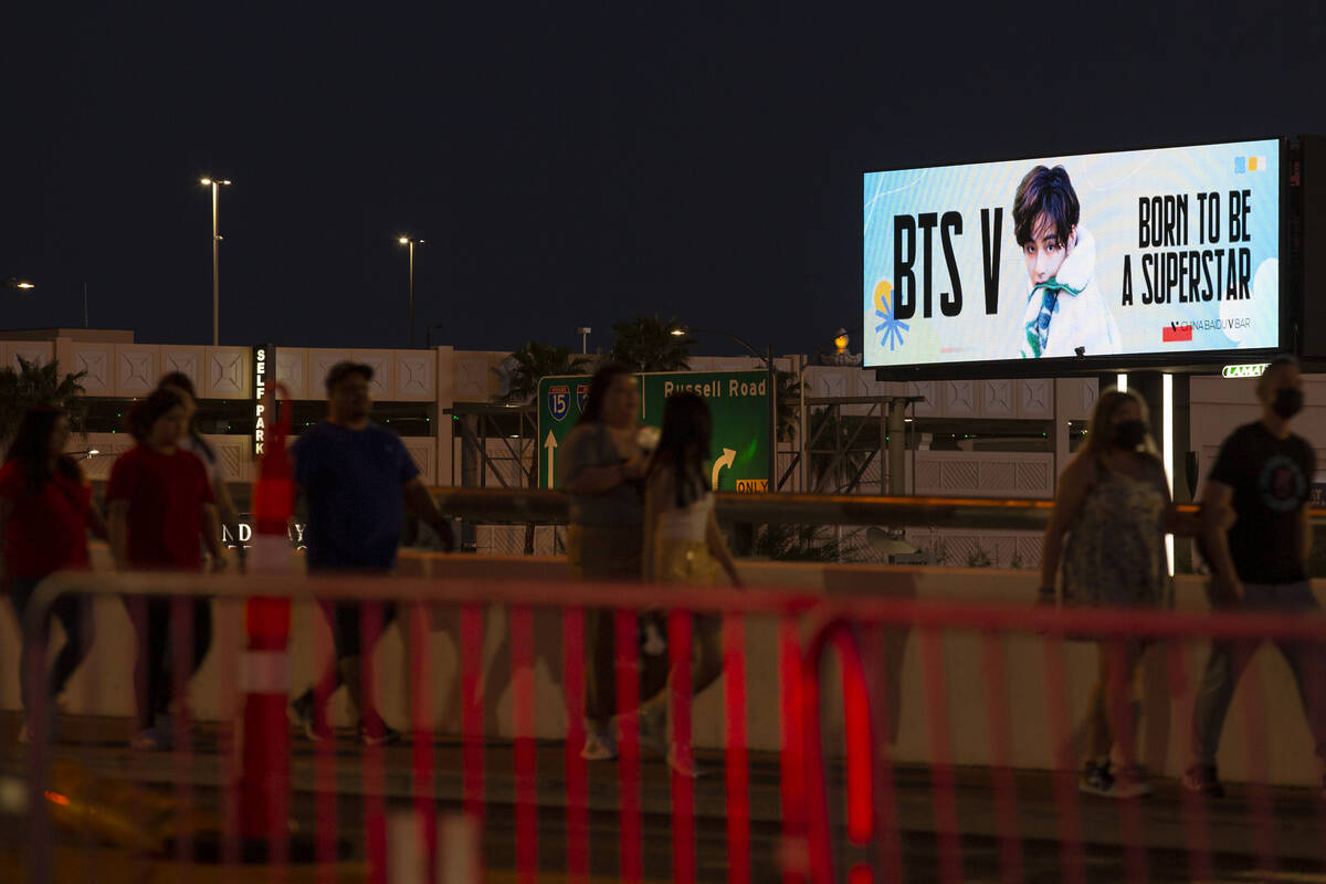 A billboard features a BTS message as Allegiant Stadium holds the Korean boy band’s sold ...