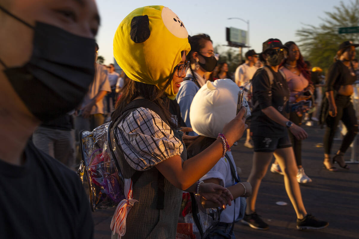 Some BTS fans wear masks to protect from COVID-19 while others refrain as the “BTS Army& ...